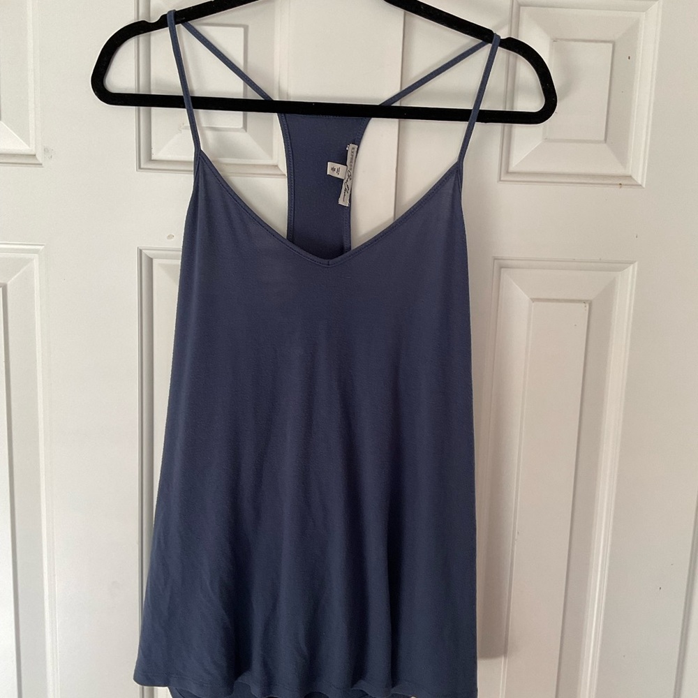 Blue flowing tank